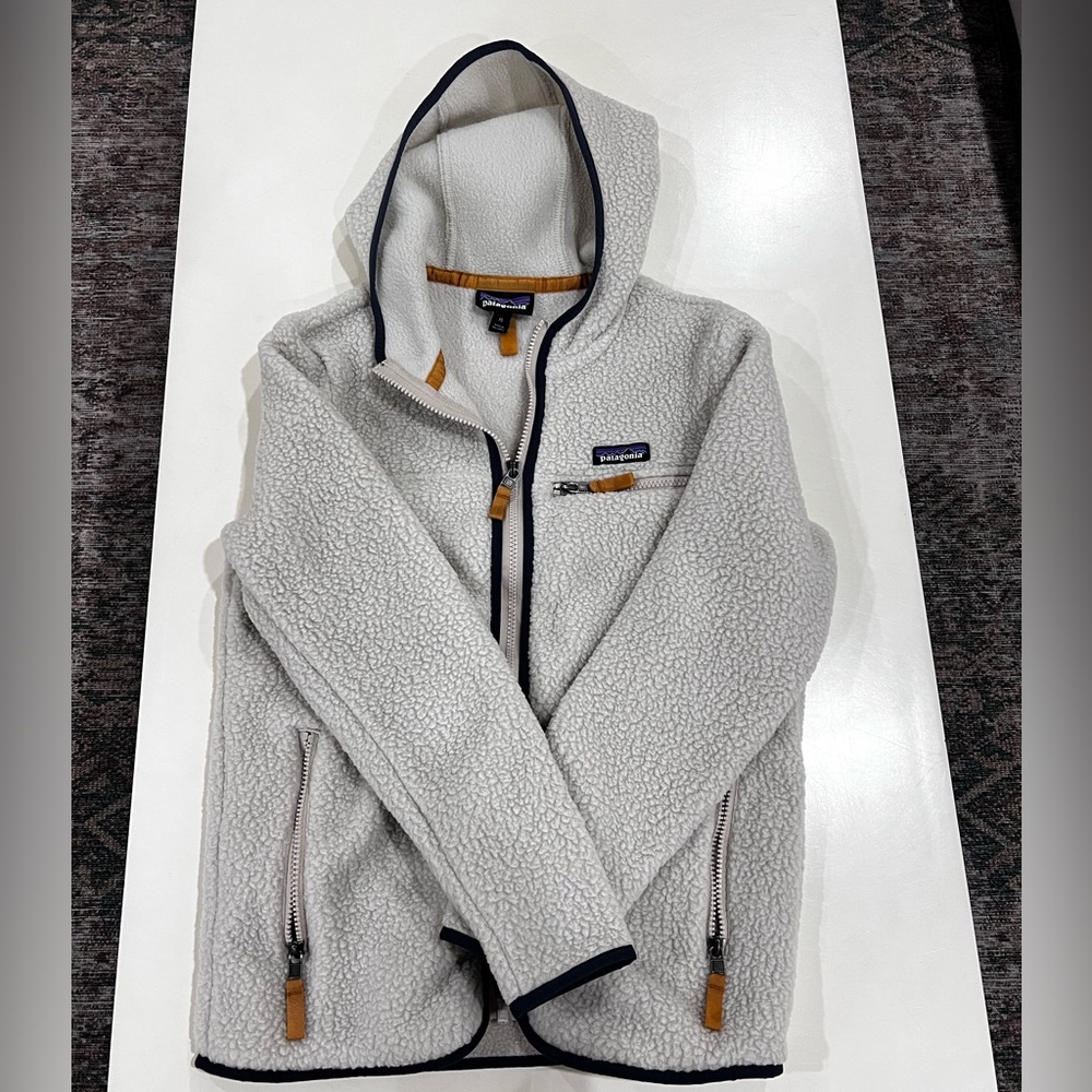 Patagonia zip up sweater, never worn, was a gift, too short for my arms.